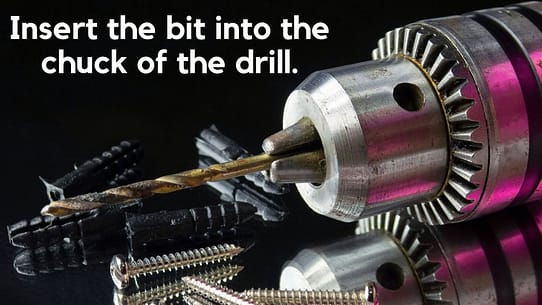 Insert the bit into the chuck of the drill.